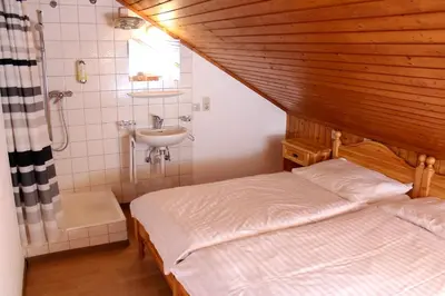 Ein Badezimmer in der Unterkunft Hôtel - Petit-déjeuner Le Trift