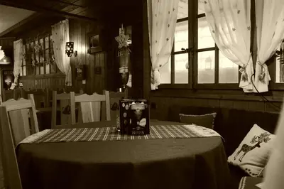 Ein Sitzbereich in der Unterkunft Hôtel - Petit-déjeuner Le Trift
