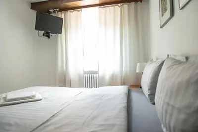 Ein Bett oder Betten in einem Zimmer der Unterkunft Locanda Poncini