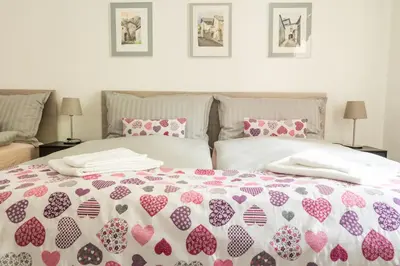 Ein Bett oder Betten in einem Zimmer der Unterkunft Locanda Poncini
