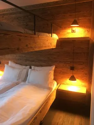 Ein Bett oder Betten in einem Zimmer der Unterkunft Le Bijou