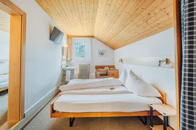 Ein Bett oder Betten in einem Zimmer der Unterkunft Gasthof Bären