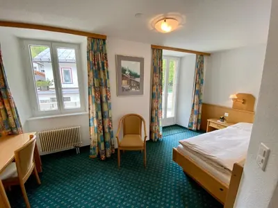 Ein Bett oder Betten in einem Zimmer der Unterkunft Hotel Portjengrat