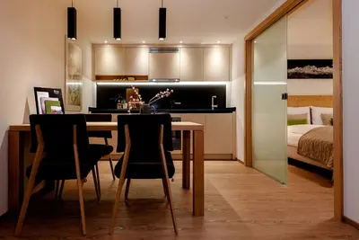 Ein Bett oder Betten in einem Zimmer der Unterkunft EVA Apartments