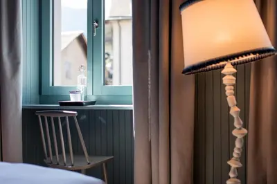 Ein Bett oder Betten in einem Zimmer der Unterkunft Hotel De Londres