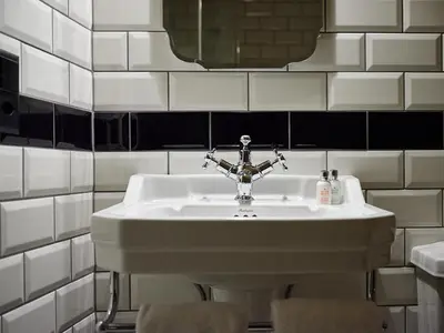 Ein Badezimmer in der Unterkunft Hotel De Londres