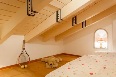 Ein Bett oder Betten in einem Zimmer der Unterkunft Hotel Berghof