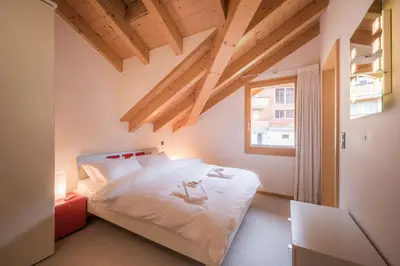 Ein Bett oder Betten in einem Zimmer der Unterkunft Chalet Fortuna 4 Penthouse