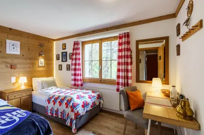Ein Bett oder Betten in einem Zimmer der Unterkunft Chalet Bergkristall