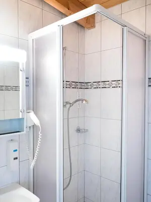 Ein Badezimmer in der Unterkunft Hotel Olympica