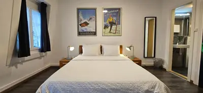 Ein Bett oder Betten in einem Zimmer der Unterkunft The Aarburg Hotel & Café