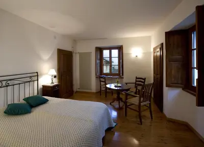 Ein Bett oder Betten in einem Zimmer der Unterkunft Pensione Ca' Serafina