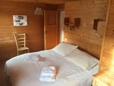 Ein Bett oder Betten in einem Zimmer der Unterkunft Magnifique chalet pour 10 personnes à Vercorin