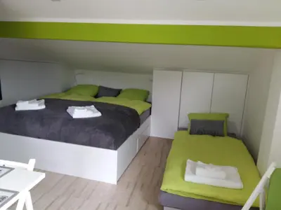Ein Bett oder Betten in einem Zimmer der Unterkunft Le Manoir de Champlan