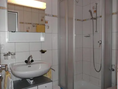Ein Badezimmer in der Unterkunft Apartments Alpenfirn Saas-Fee