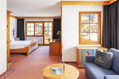 Ein Bett oder Betten in einem Zimmer der Unterkunft Hotel Bodmi