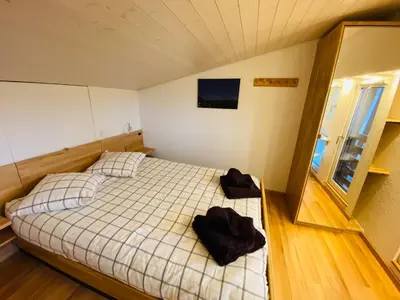 Ein Bett oder Betten in einem Zimmer der Unterkunft Crans-Montana Stunning Southview Flat