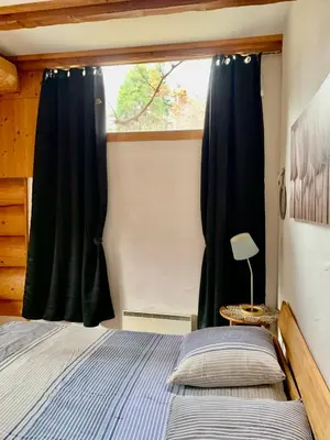 Ein Bett oder Betten in einem Zimmer der Unterkunft Le Gite de Briey - à 7 minutes de Vercorin