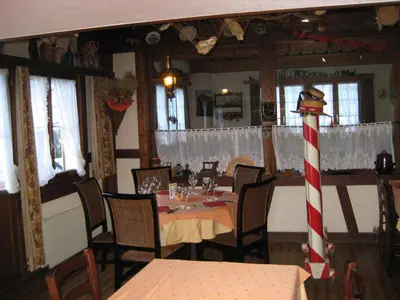 Ein Restaurant oder anderes Speiselokal in der Unterkunft Hotel Pension Spycher