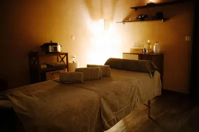 Ein Bett oder Betten in einem Zimmer der Unterkunft Alpine Hotel Perren