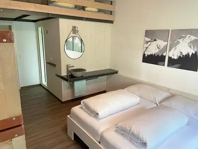 Ein Bett oder Betten in einem Zimmer der Unterkunft Hotel GO-IN