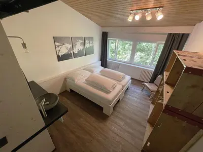 Ein Bett oder Betten in einem Zimmer der Unterkunft Hotel GO-IN