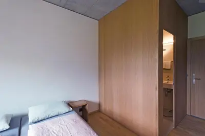 Ein Bett oder Betten in einem Zimmer der Unterkunft Interlaken Youth Hostel
