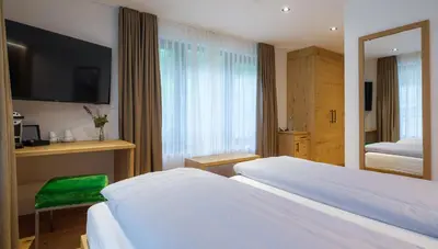 Ein Bett oder Betten in einem Zimmer der Unterkunft Hotel La Reserve