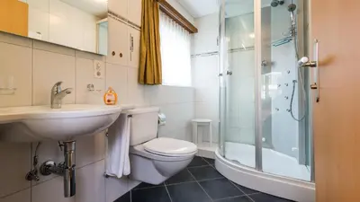 Ein Badezimmer in der Unterkunft Apartments Atlas