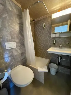 Ein Badezimmer in der Unterkunft central beauty scenery apartment