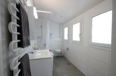Ein Badezimmer in der Unterkunft Interlaken Central 2