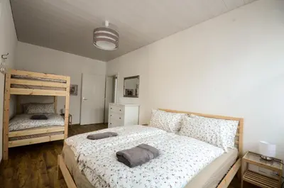 Ein Bett oder Betten in einem Zimmer der Unterkunft Interlaken Central 2