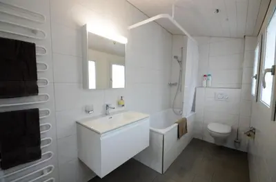 Ein Badezimmer in der Unterkunft Interlaken Central 3