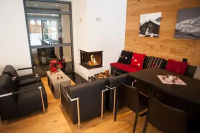 Ein Sitzbereich in der Unterkunft Elite Alpine Lodge - Apart & Breakfast