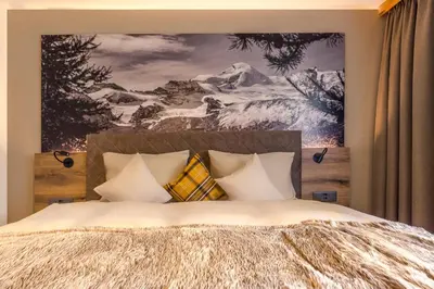 Ein Bett oder Betten in einem Zimmer der Unterkunft Arcade Apartments & Spa