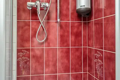 Ein Badezimmer in der Unterkunft Hotel Gletscherblick Grindelwald