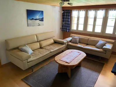 Ein Sitzbereich in der Unterkunft Chalet Herrschaft