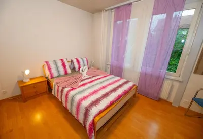 Ein Bett oder Betten in einem Zimmer der Unterkunft Residence Villa Flora