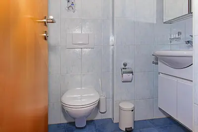 Ein Badezimmer in der Unterkunft Apartment Aura