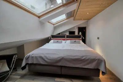 Ein Bett oder Betten in einem Zimmer der Unterkunft Chalet Abacus