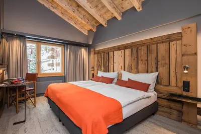 Ein Bett oder Betten in einem Zimmer der Unterkunft BaseCamp Hotel