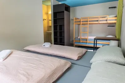 Ein Bett oder Betten in einem Zimmer der Unterkunft Zermatt Youth Hostel