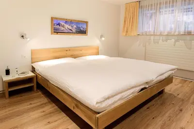 Ein Bett oder Betten in einem Zimmer der Unterkunft Jolimont Apartments