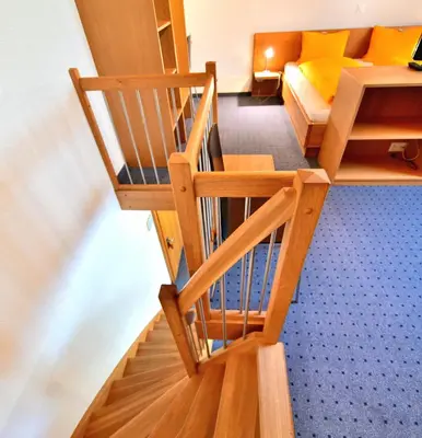 Ein Bett oder Betten in einem Zimmer der Unterkunft Hotel Wetterhorn