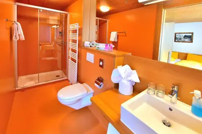 Ein Badezimmer in der Unterkunft Hotel Wetterhorn