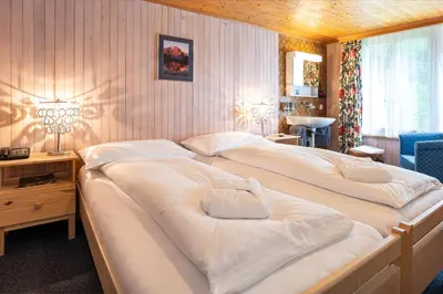 Ein Bett oder Betten in einem Zimmer der Unterkunft Basic Rooms Jungfrau Lodge