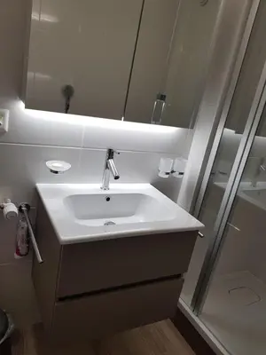Ein Badezimmer in der Unterkunft Télérésidence