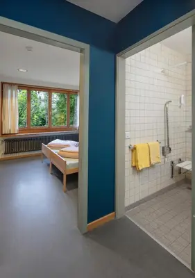 Ein Bett oder Betten in einem Zimmer der Unterkunft Grindelwald Youth Hostel