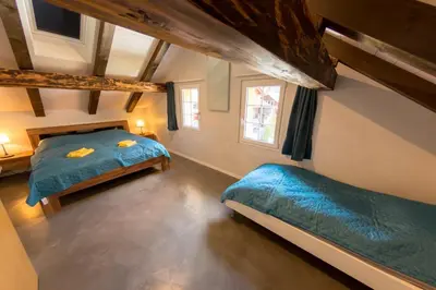 Ein Bett oder Betten in einem Zimmer der Unterkunft Chalet 1752
