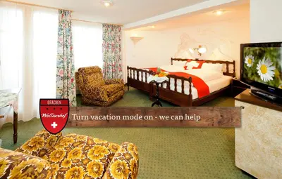 Ein Bett oder Betten in einem Zimmer der Unterkunft Hotel Walliserhof - The Dom Collection